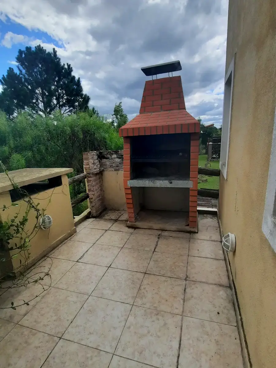 La parrilla, en la terraza, en Rosa.
